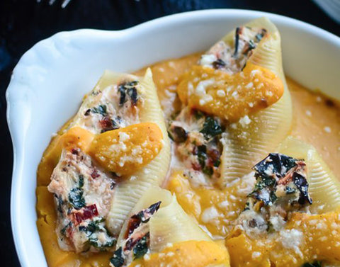 Ricotta stuffed shells with butternut squash sauce